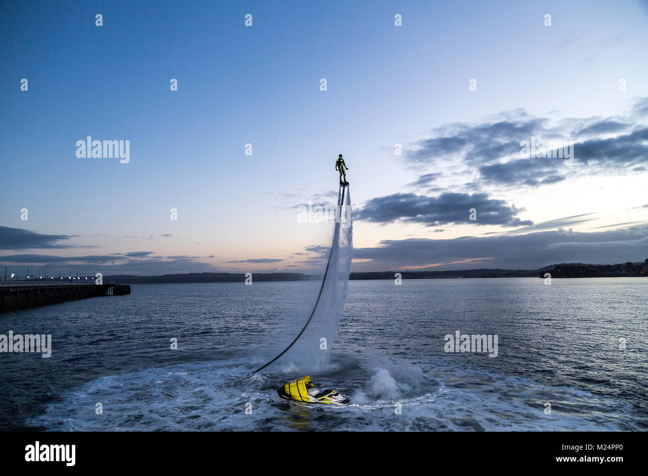 A device attached to the feet that propels a person through the air by