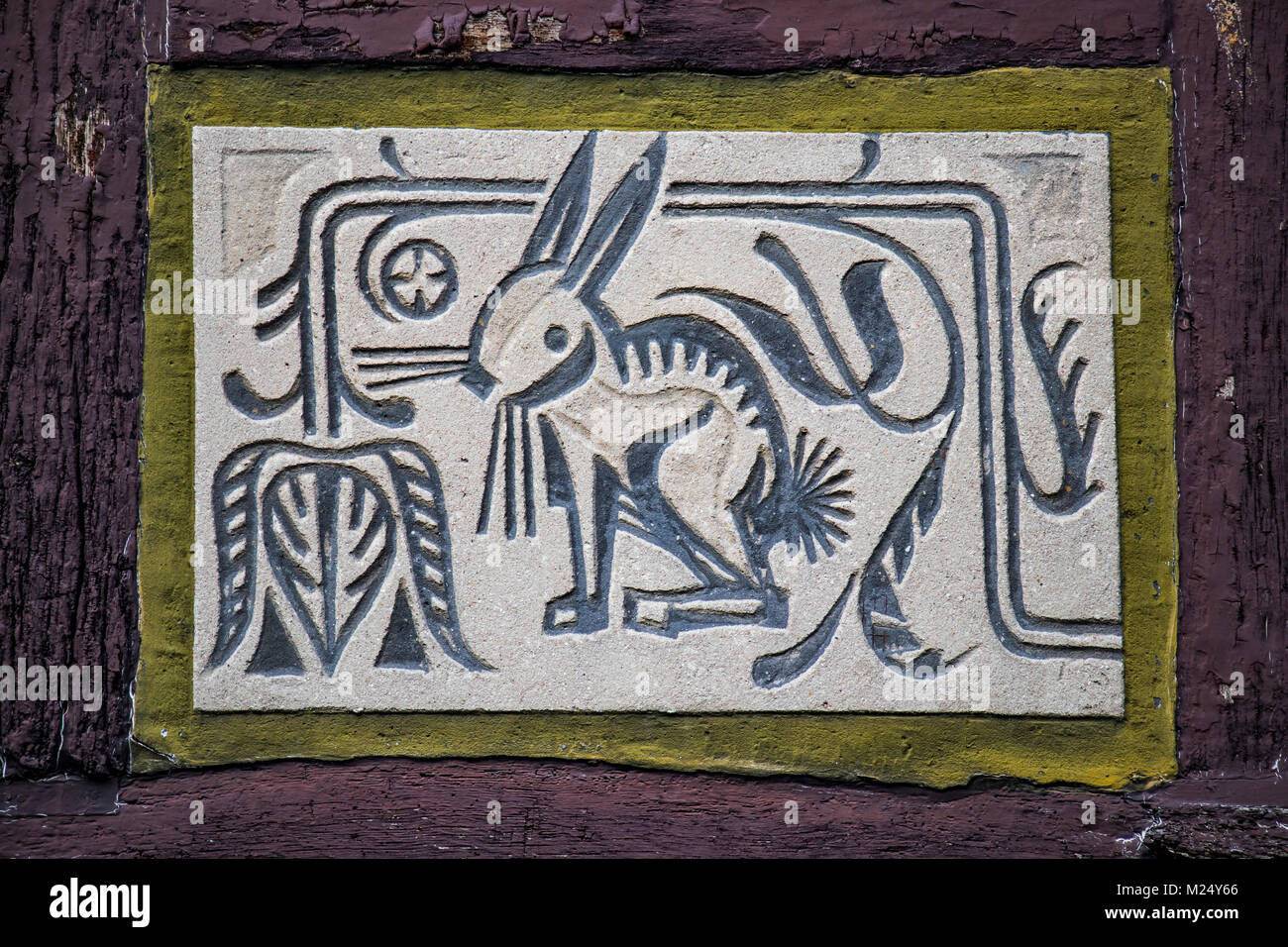 facade paintings at half-timbered house in old town of Alsfeld, Hesse, Germany, animal motif rabbit Stock Photo