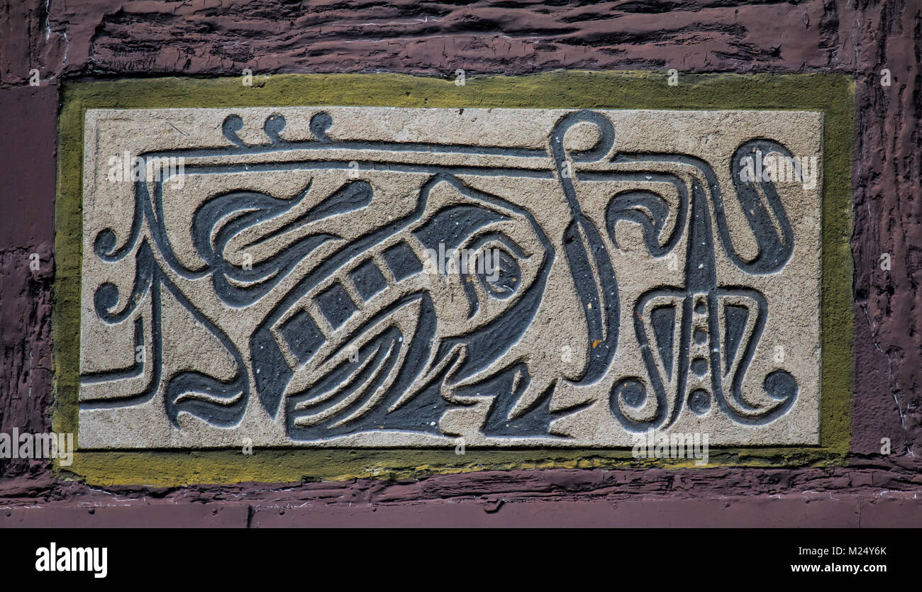 facade paintings at half-timbered house in old town of Alsfeld, Hesse, Germany, animal motif frog Stock Photo