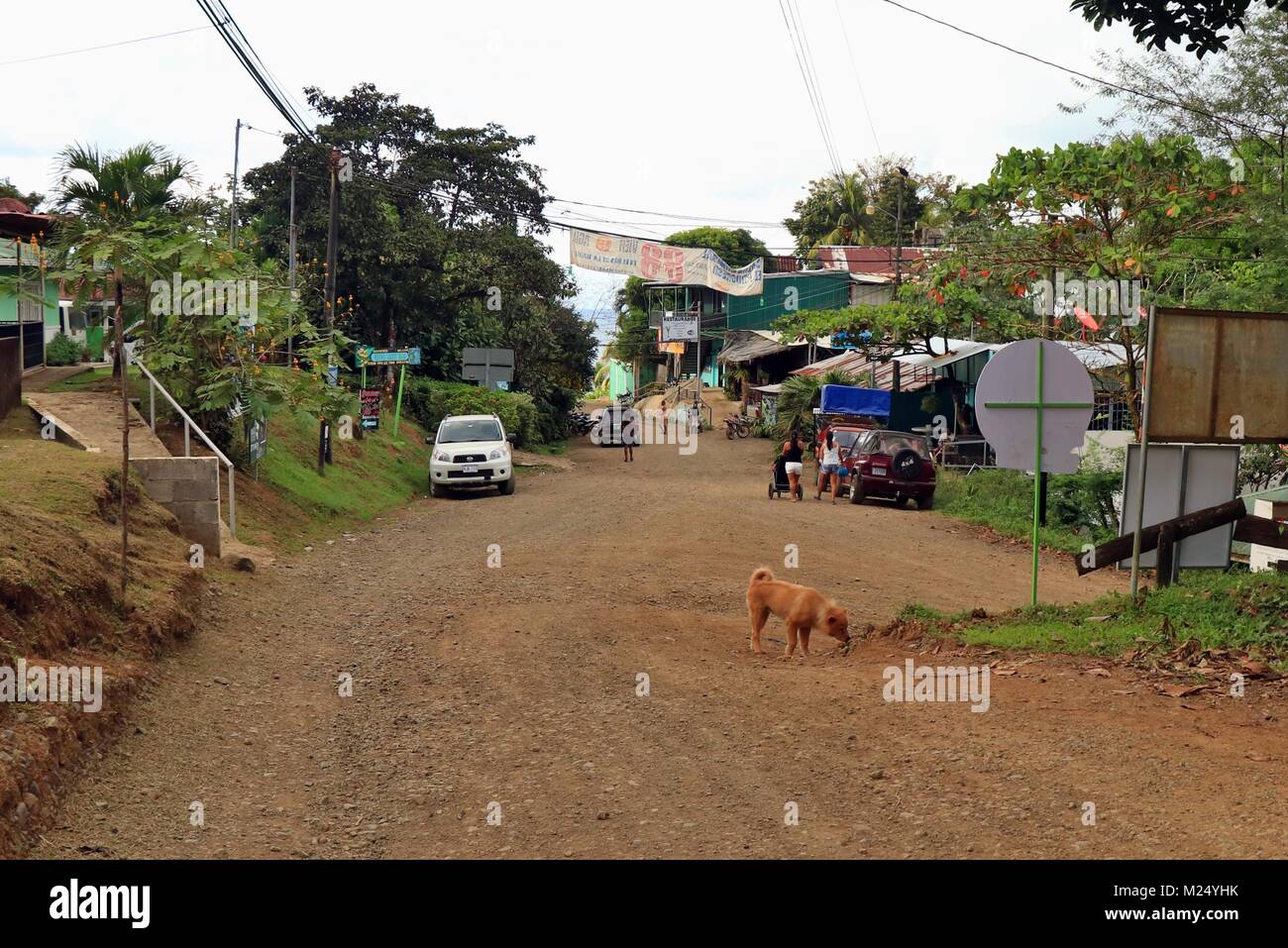 Main street through the remote jungle village of Drake Bay on the Osa Peninsula in Southern Costa Rica. Stock Photo