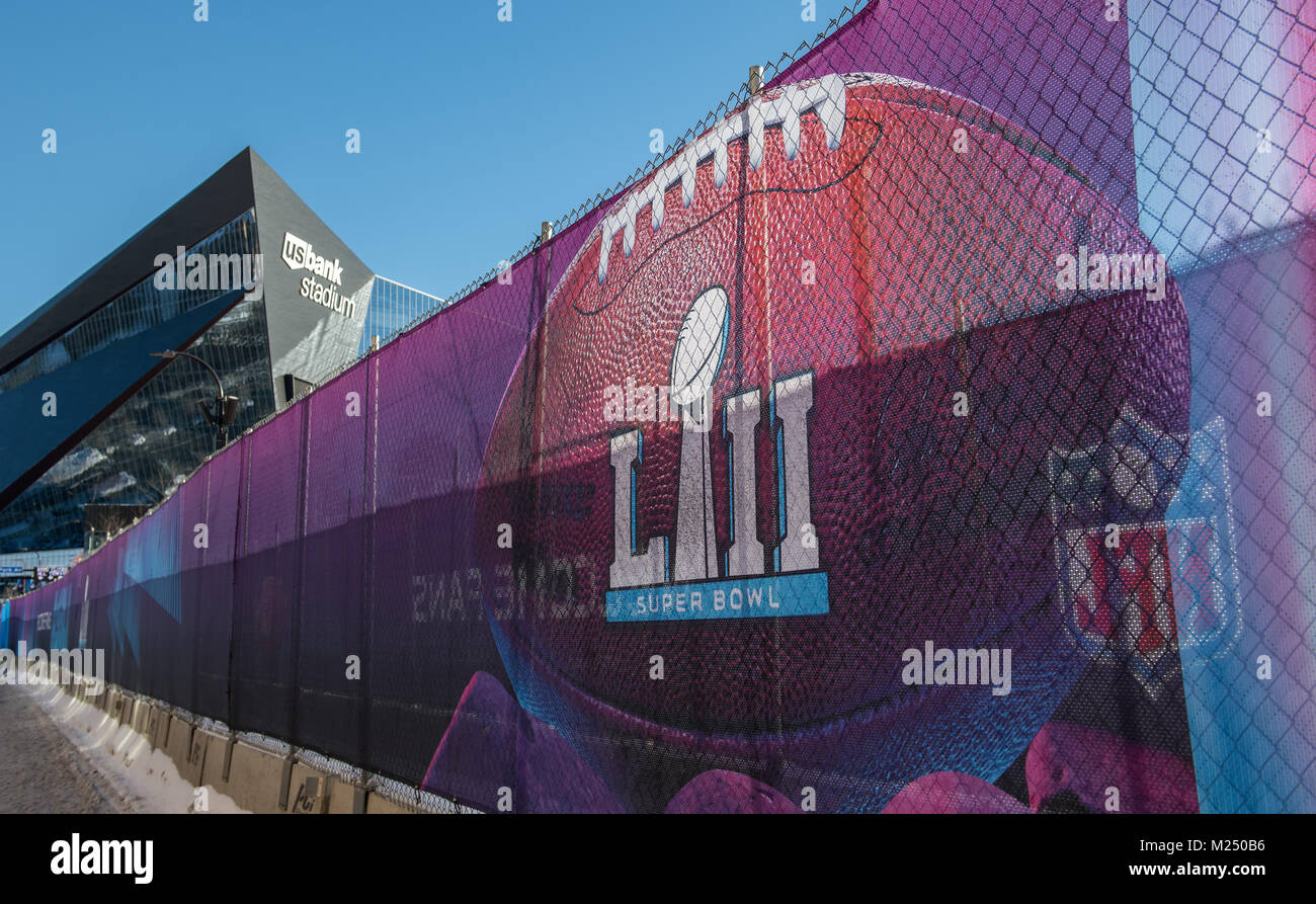 Promotional banners adorn security fences around US Bank Stadium on game day for Super Bowl LII in Minneapolis, Minnesota Stock Photo