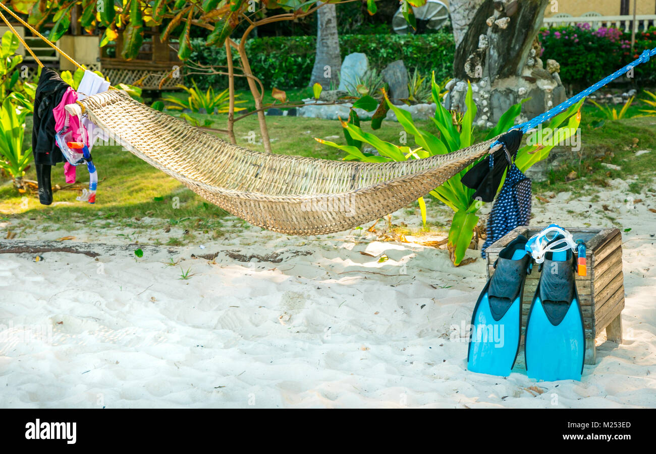 Authentic view of snorkeling equipment drying near a traditional Stock Photo