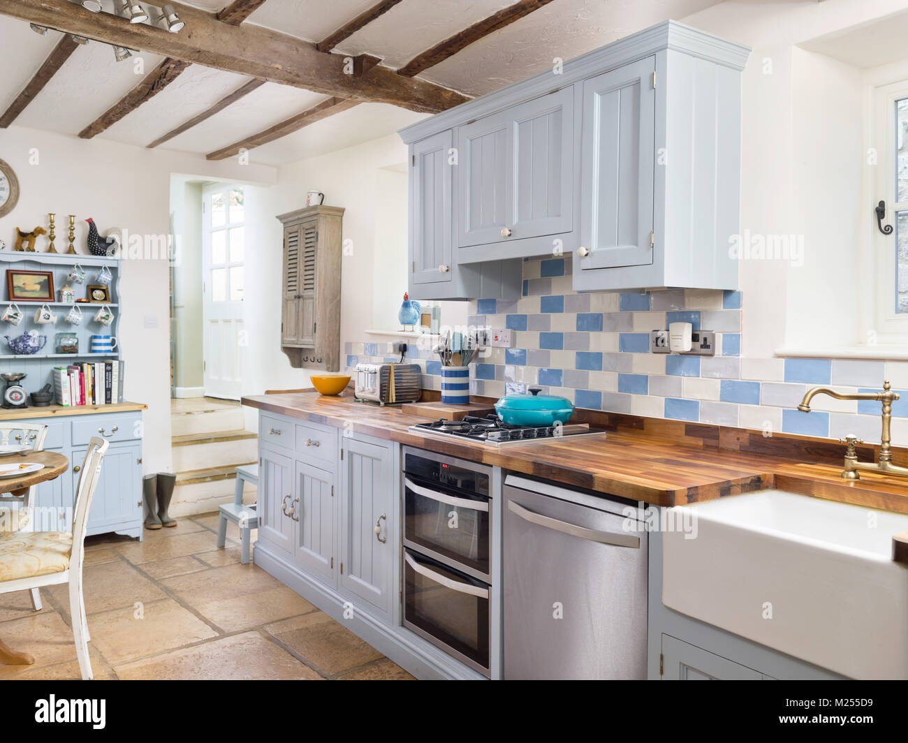 A country kitchen in a traditional English cottage home. Stock Photo
