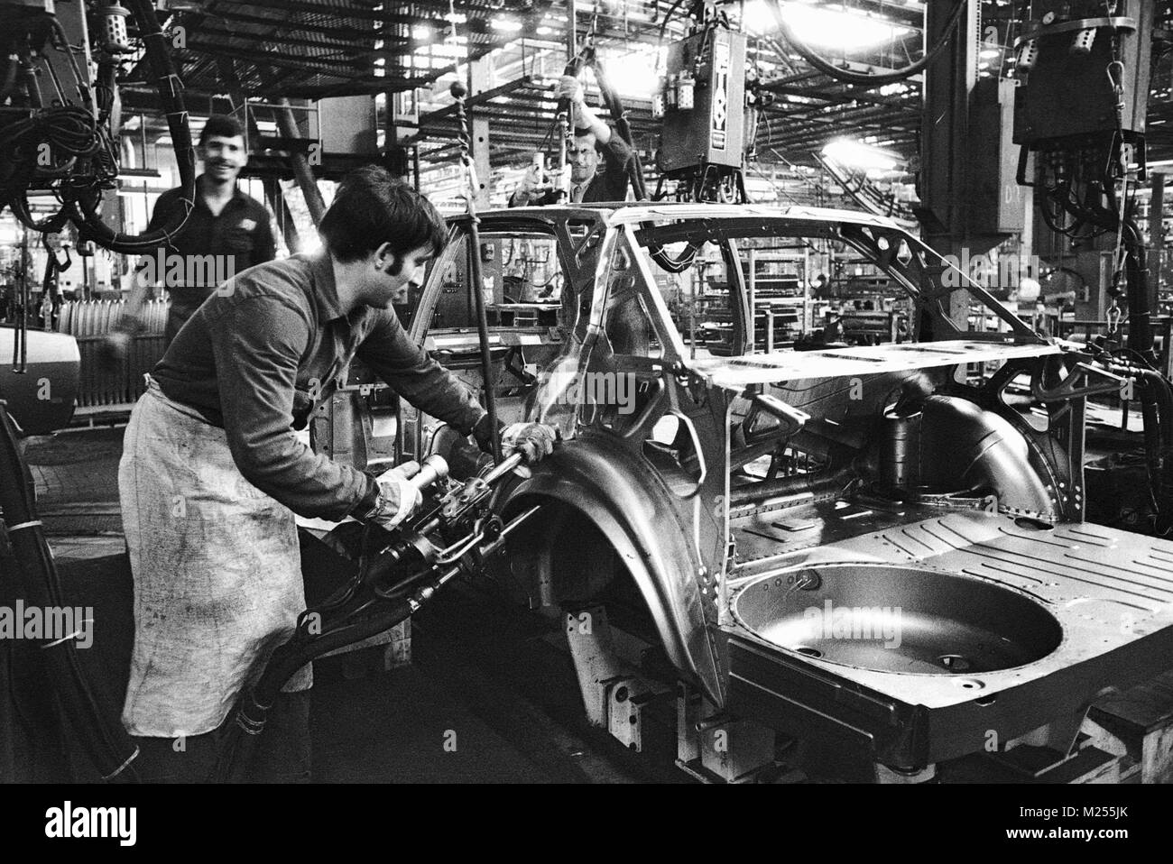 assembly lines in the car factory Alfa Romeo in Arese (Milan, Mars 1978) Stock Photo