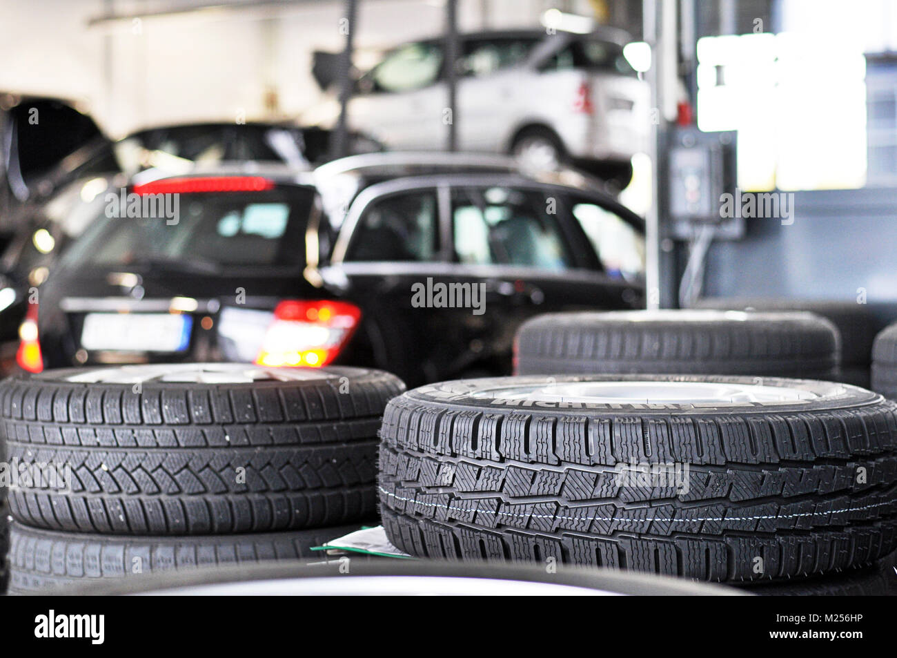 tyre change in a garage closeup tyre tread stack tyres for sales