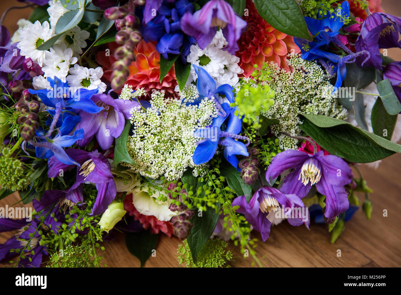 Colourful floral arrangement on wedding reception table, close up Stock Photo