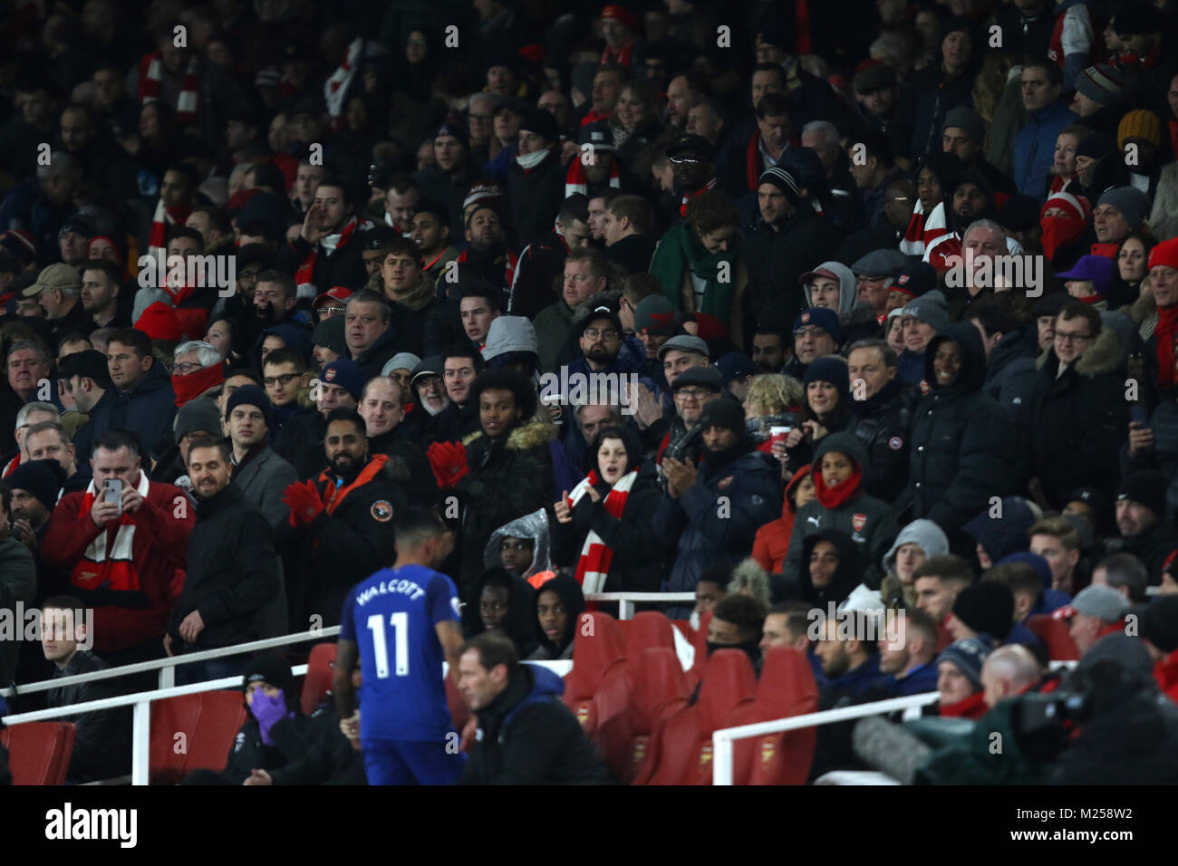 London, UK. 3rd Feb, 2018. Arsenal fans applaud their former player Theo Walcott (E) as he makes his way to the bench after being substituted at the Arsenal v Everton English Premier League match, at The Emirates Stadium, London, on February 3, 2018 **THIS PICTURE IS FOR EDITORIAL USE ONLY** Credit: Paul Marriott/Alamy Live News Stock Photo