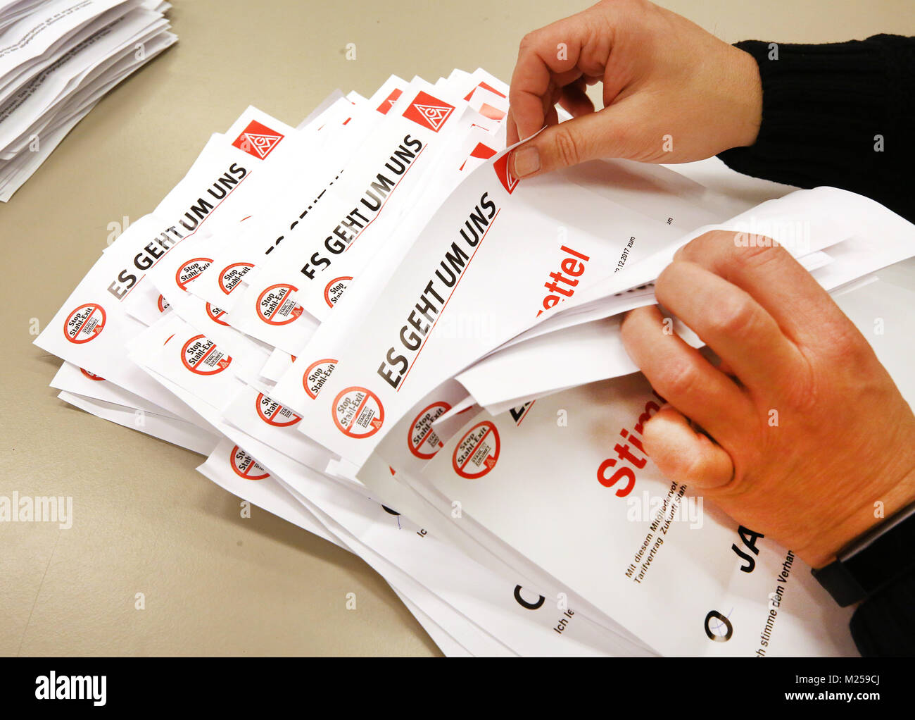 Essen, Germany. 05th Feb, 2018. Members of the Betriebsrat (works council) at ThyssenKrupp counting the ballot papers for the outcome of negotiations on the Tarifvertrag (labout agreement) on the merger with Tata, in Essen, Germany, 05 February 2018. Credit: Roland Weihrauch/dpa/Alamy Live News Stock Photo