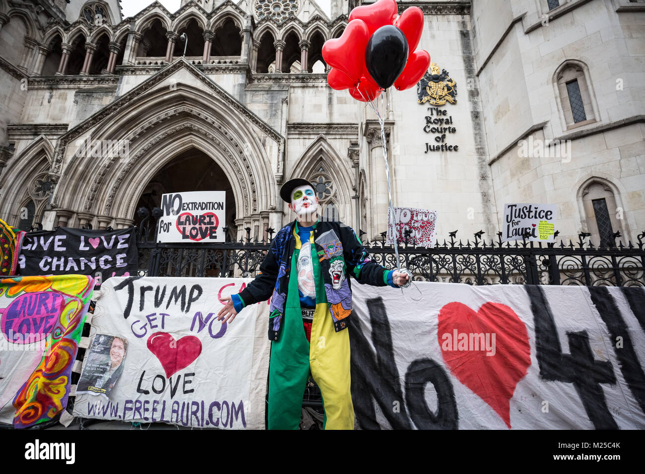 London, UK. 5th Feb, 2018. Supporters of Lauri Love outside The Royal Courts of Justice on the day of his extradition verdict. Love is charged with masterminding a 2013 cyber-attack by Anonymous on US government websites. Credit: Guy Corbishley/Alamy Live News Stock Photo