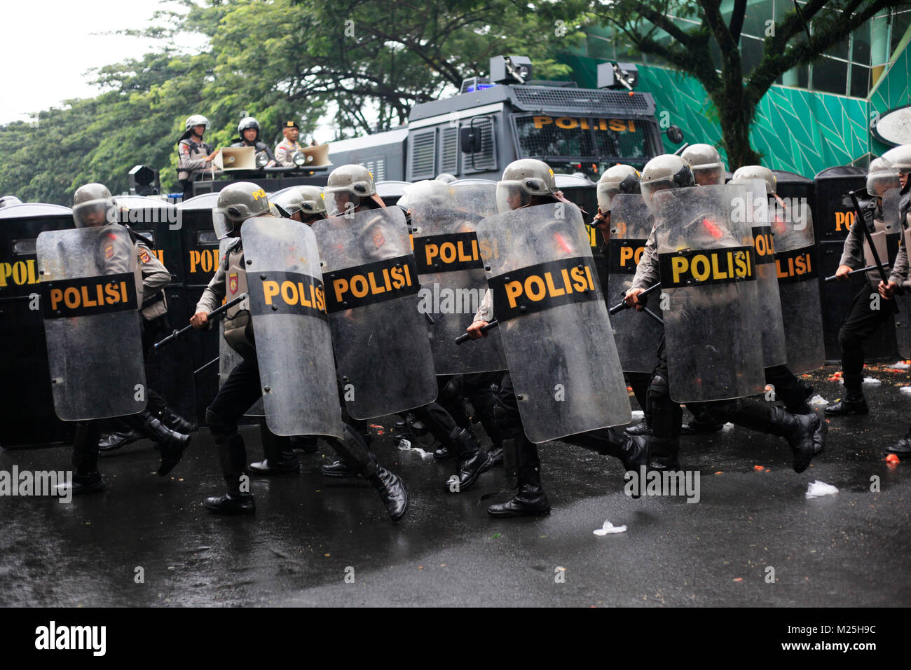 Indonesian police made barricades in securing demonstrations during a security simulation of local elections at Bogor, West Java, Indonesia. 3 February 2018 Stock Photo