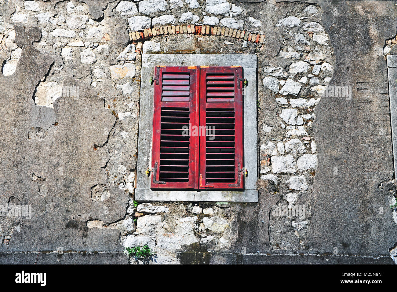 Closed window with shutters in the old european house Stock Photo - Alamy