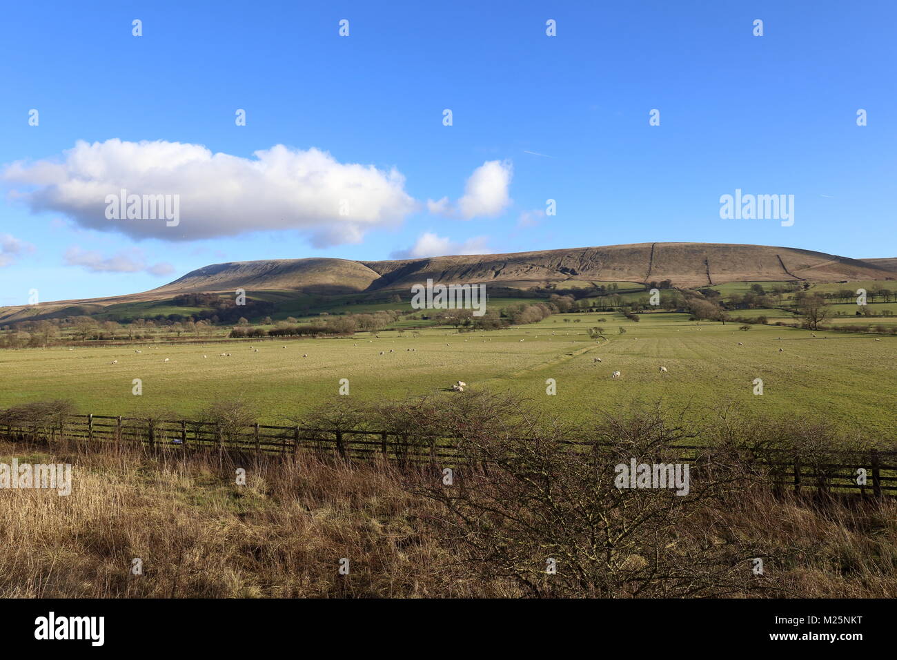 Imposing Pendle Hill, Lancashire, with paragliders in the distance. Stock Photo
