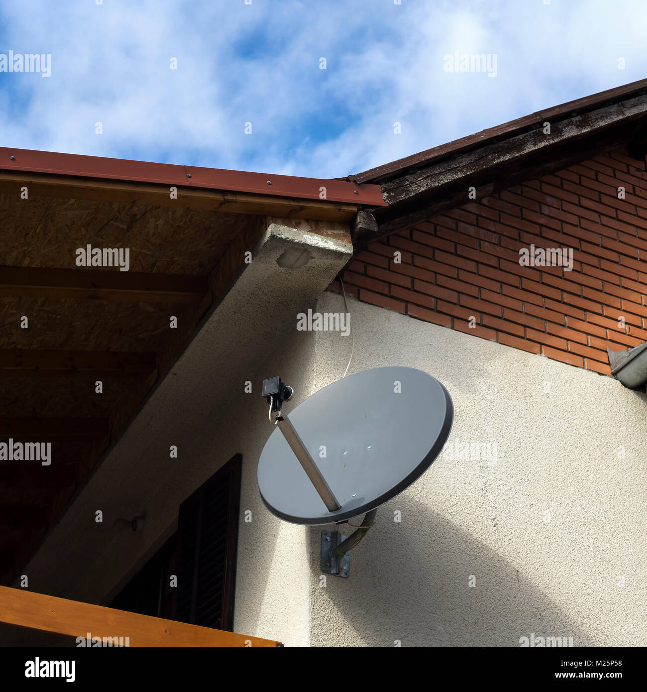 Satellite antenna on a house facade, outdoor Stock Photo Alamy