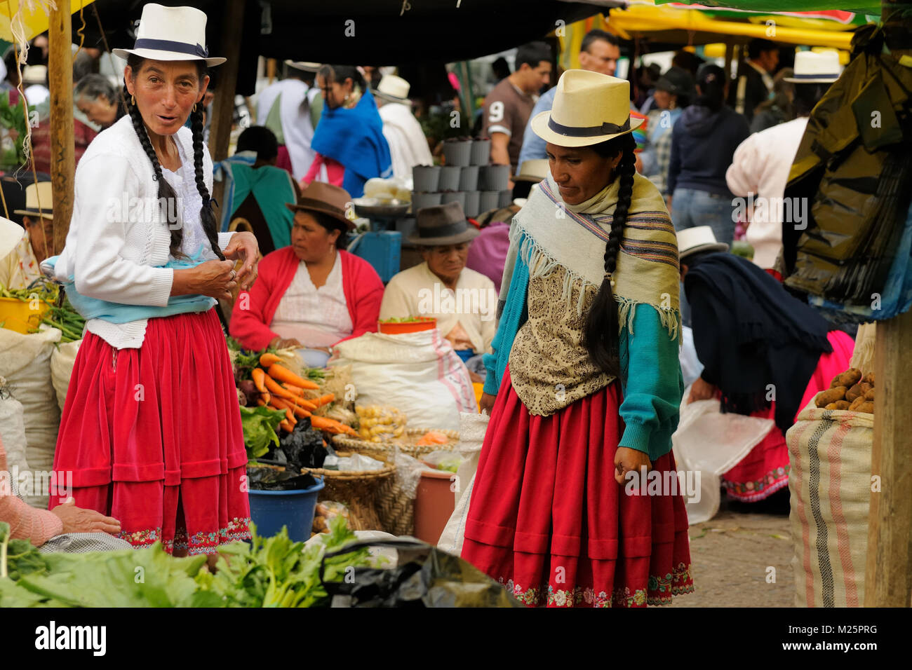 Ecuador, Gualaceo - August 22: Ecuadorian ethnic women in national
