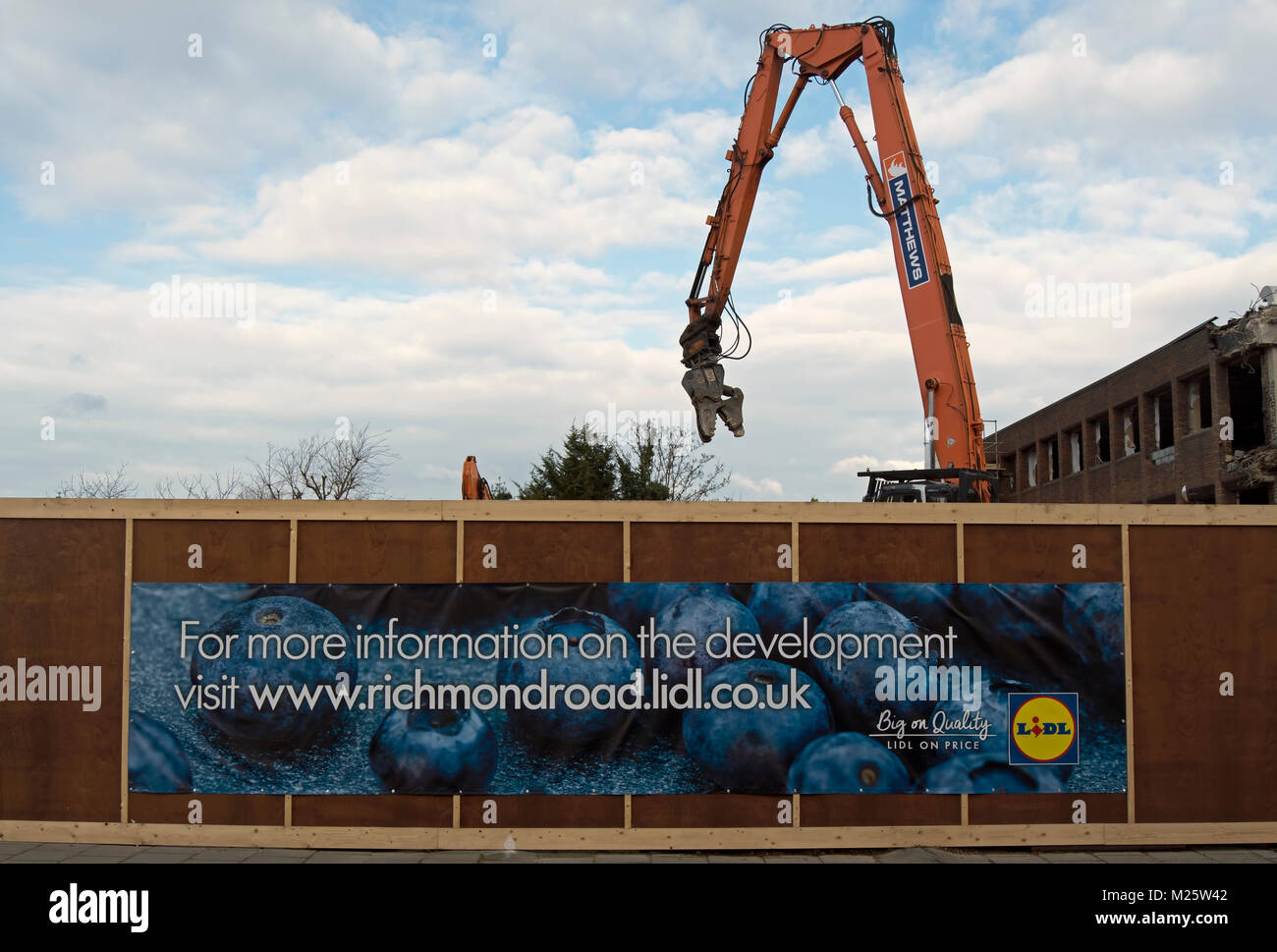 Banner Sign At The Construction Site Of A New Branch Of The Stock