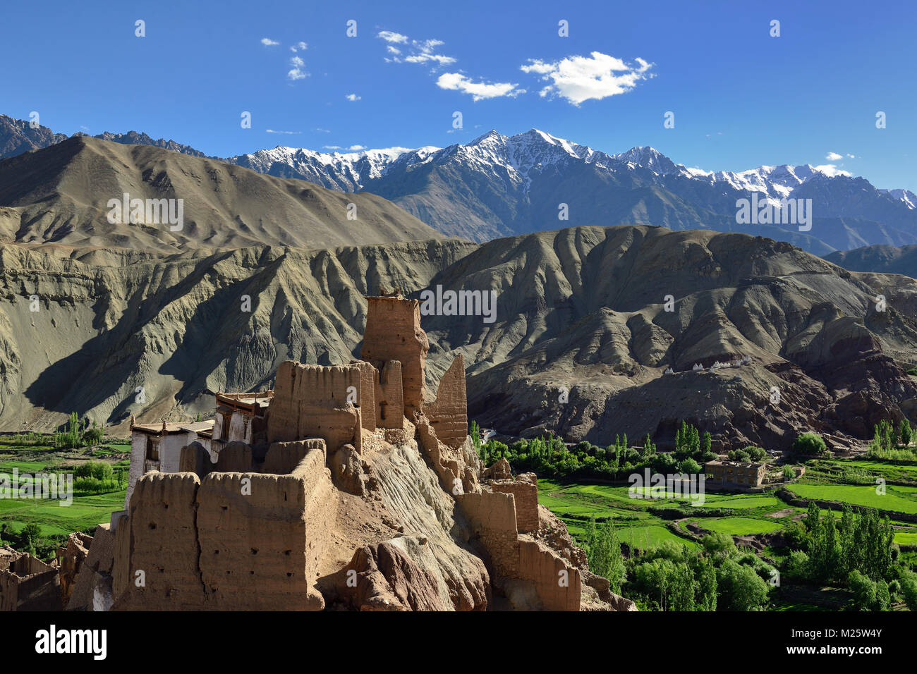 View on the beautifully located Buddhist monastery in the Basgo village in the background one can see the mountains Ladakh Stock Photo