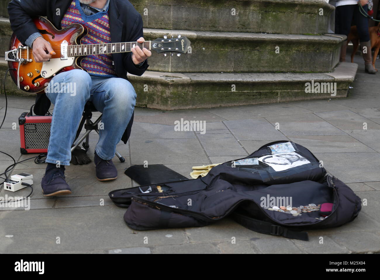 Busker with Guitar in Winchester Stock Photo
