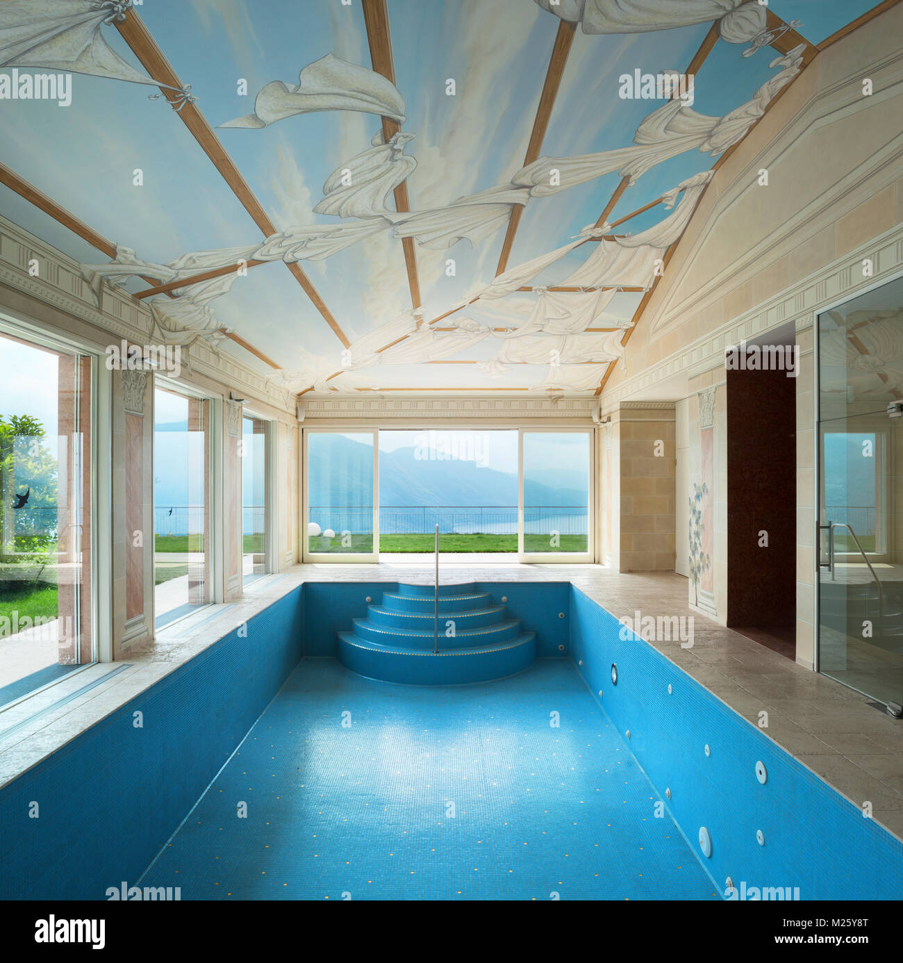 Interior, luxury villa, pool decorated with frescoes Stock Photo - Alamy