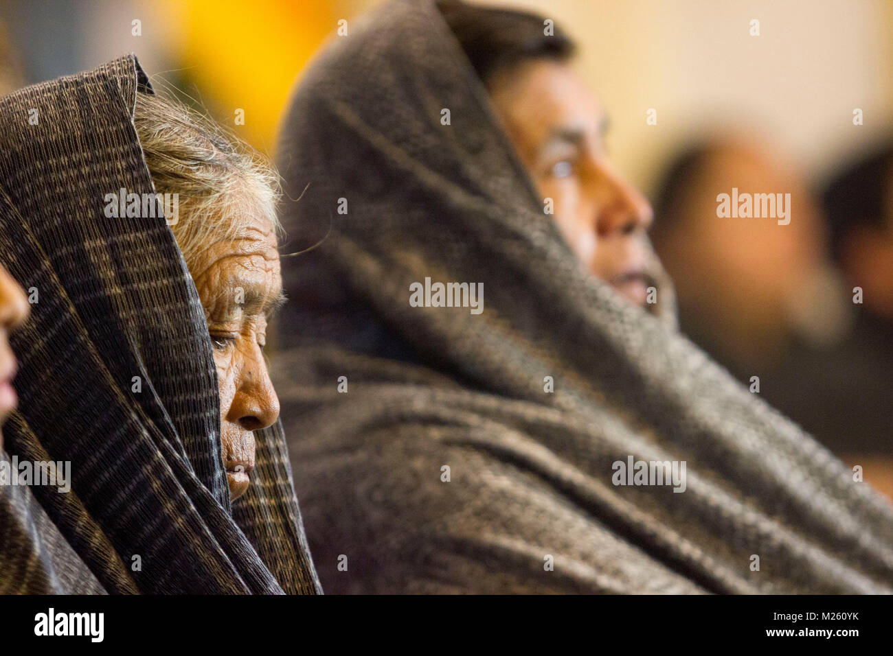 A portrait of two mexican indigenous women with their heads covered by a rebozo Stock Photo