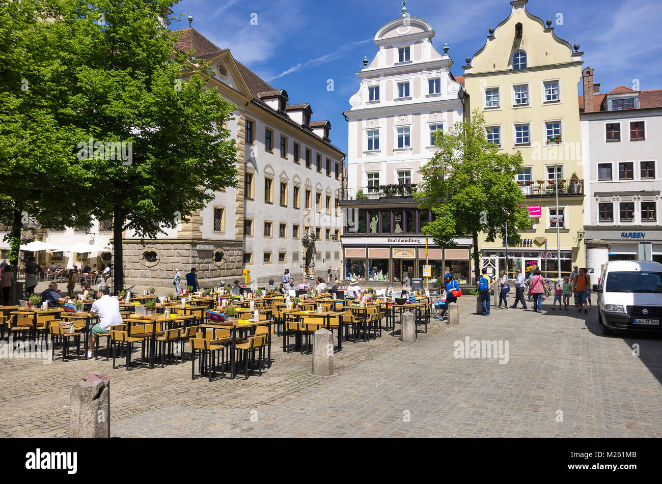 Historic architecture and street scene on Kohlenmarkt Square in Regensburg, Bavaria, Germany. Stock Photo