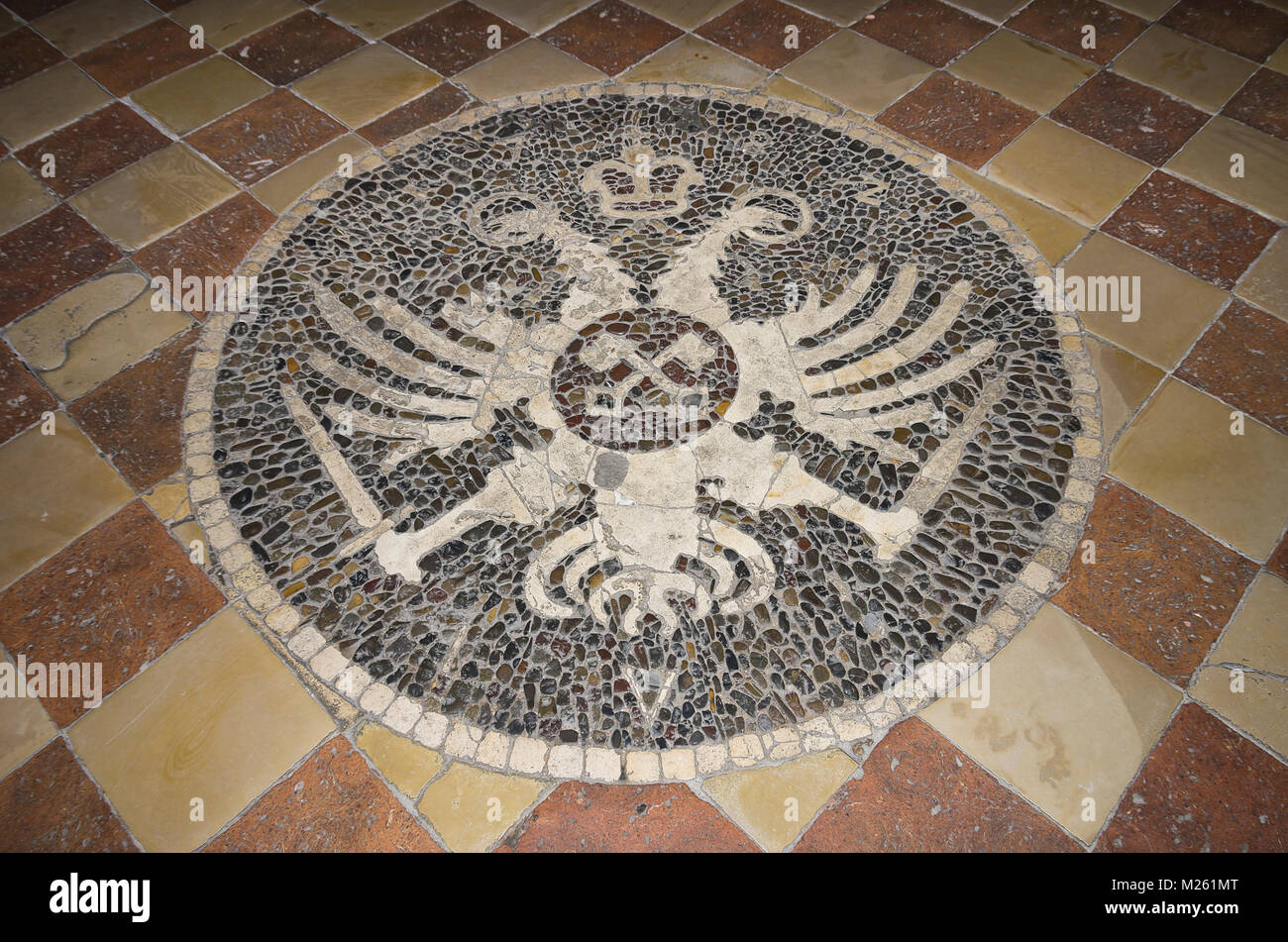 The double imperial eagle of the Habsburgs with the city coat of arms in the Old Town Hall of Regensburg, Bavaria, Germany. Stock Photo