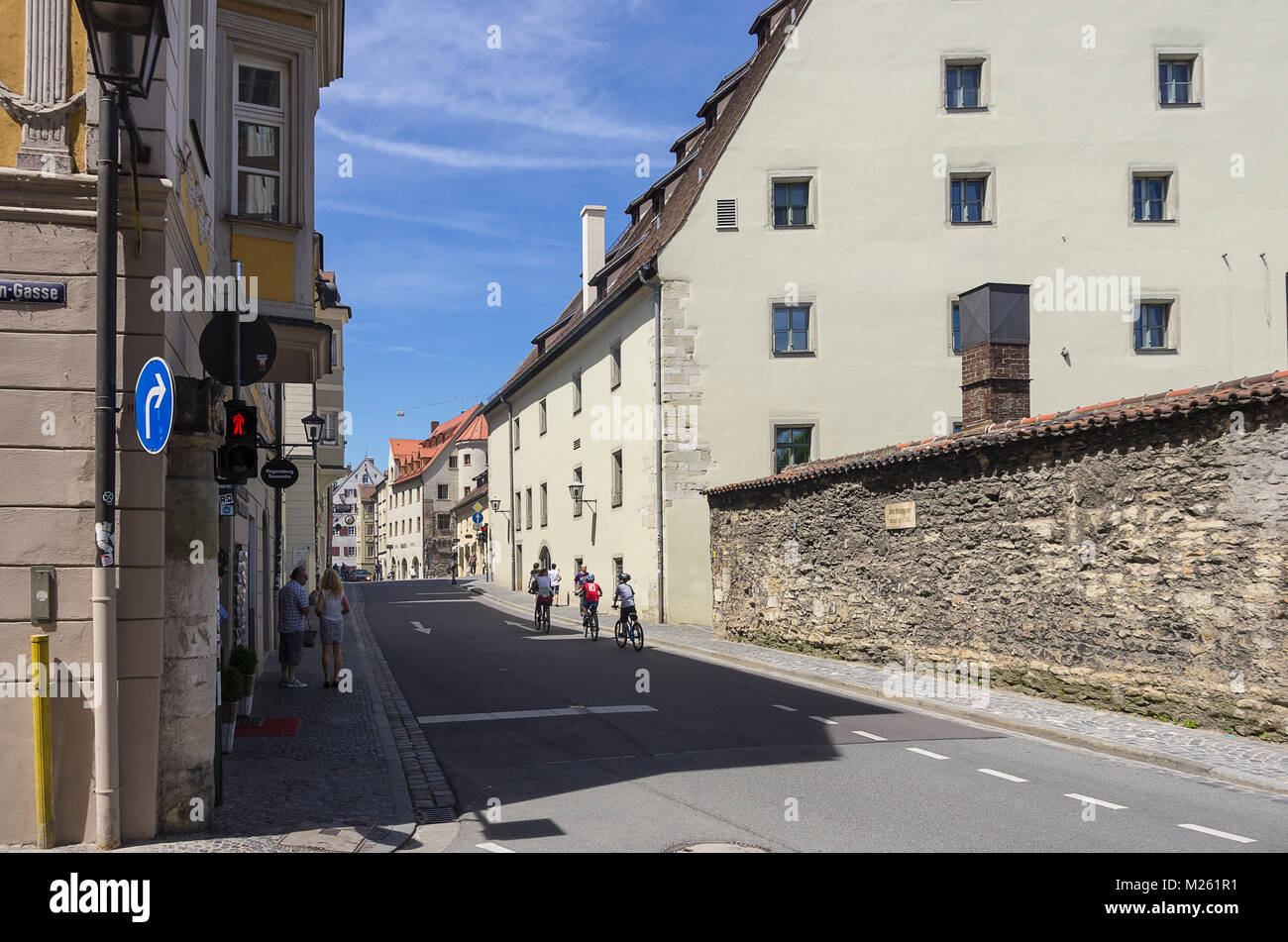 Regensburg, Germany - May 22, 2016: A view down the Goldene Bären Street towards Fischmarkt Square in Regensburg, Bavaria, Germany. Stock Photo