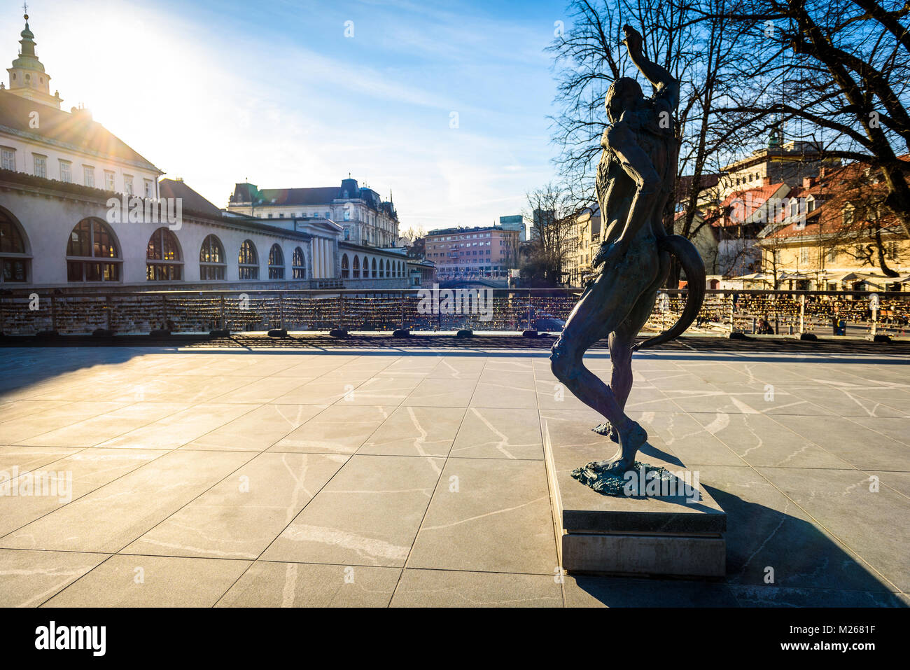 Statue of Prometheus on Butchers' bridge over river Ljubljanica ...
