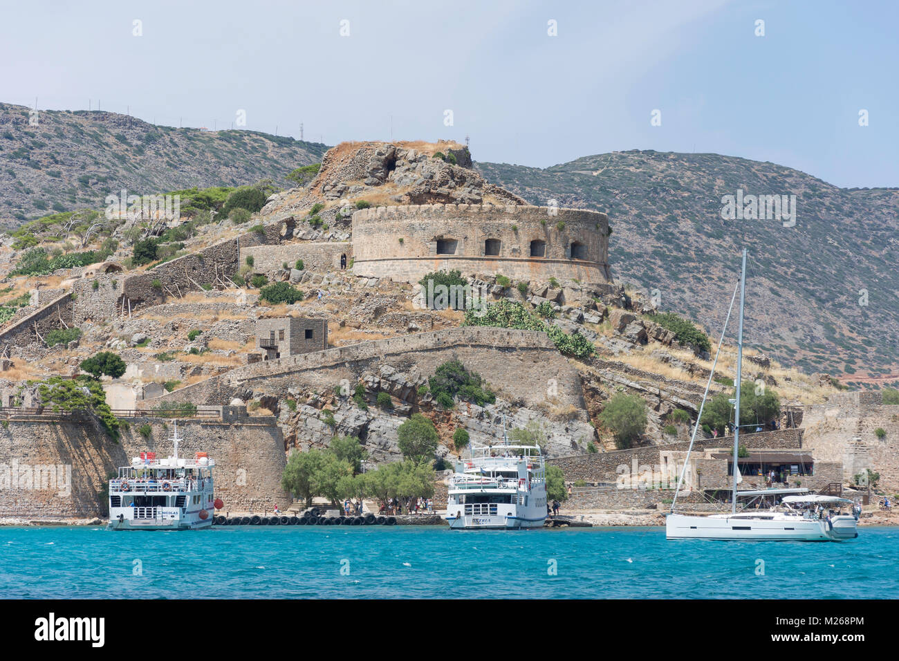 Venetian fortifications and cruise boats, Spinalonga (Kalydon) Island ...