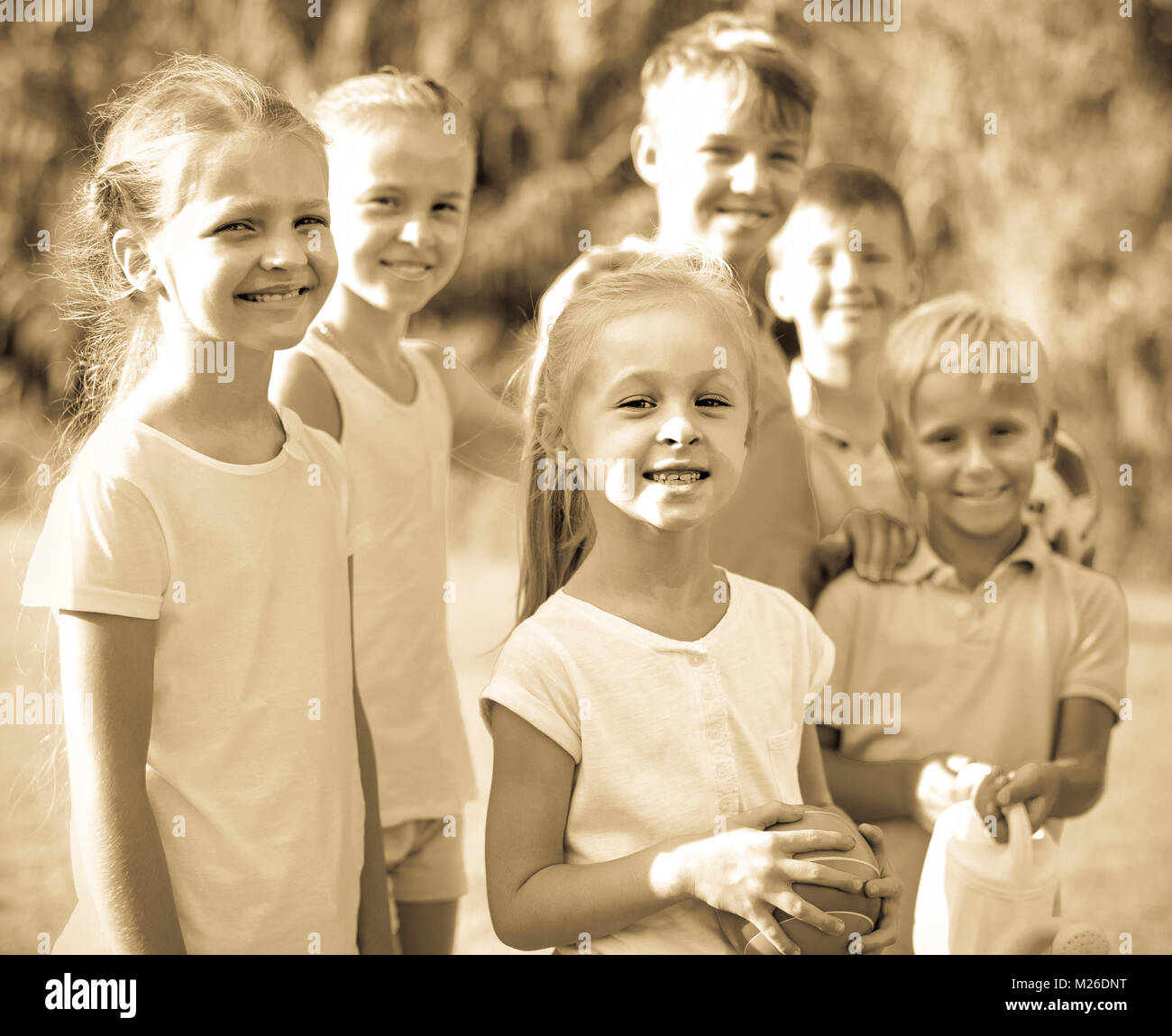 Group kids laughing holding hi-res stock photography and images - Alamy