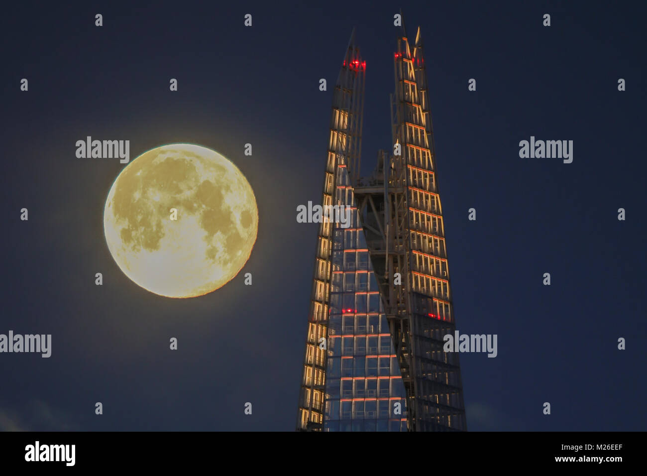 The Shard and Large Moon Stock Photo
