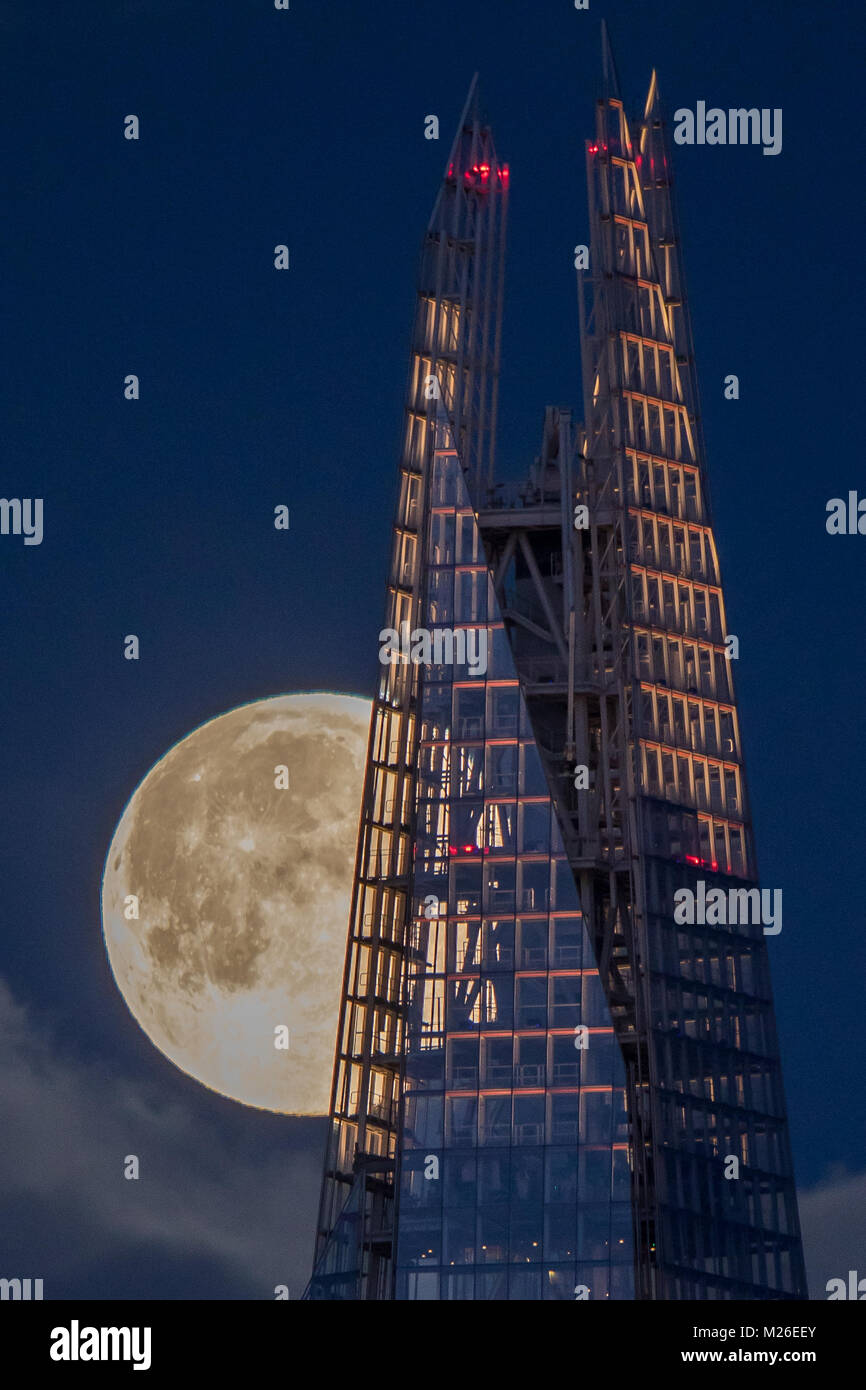 The Shard and Large Moon Stock Photo