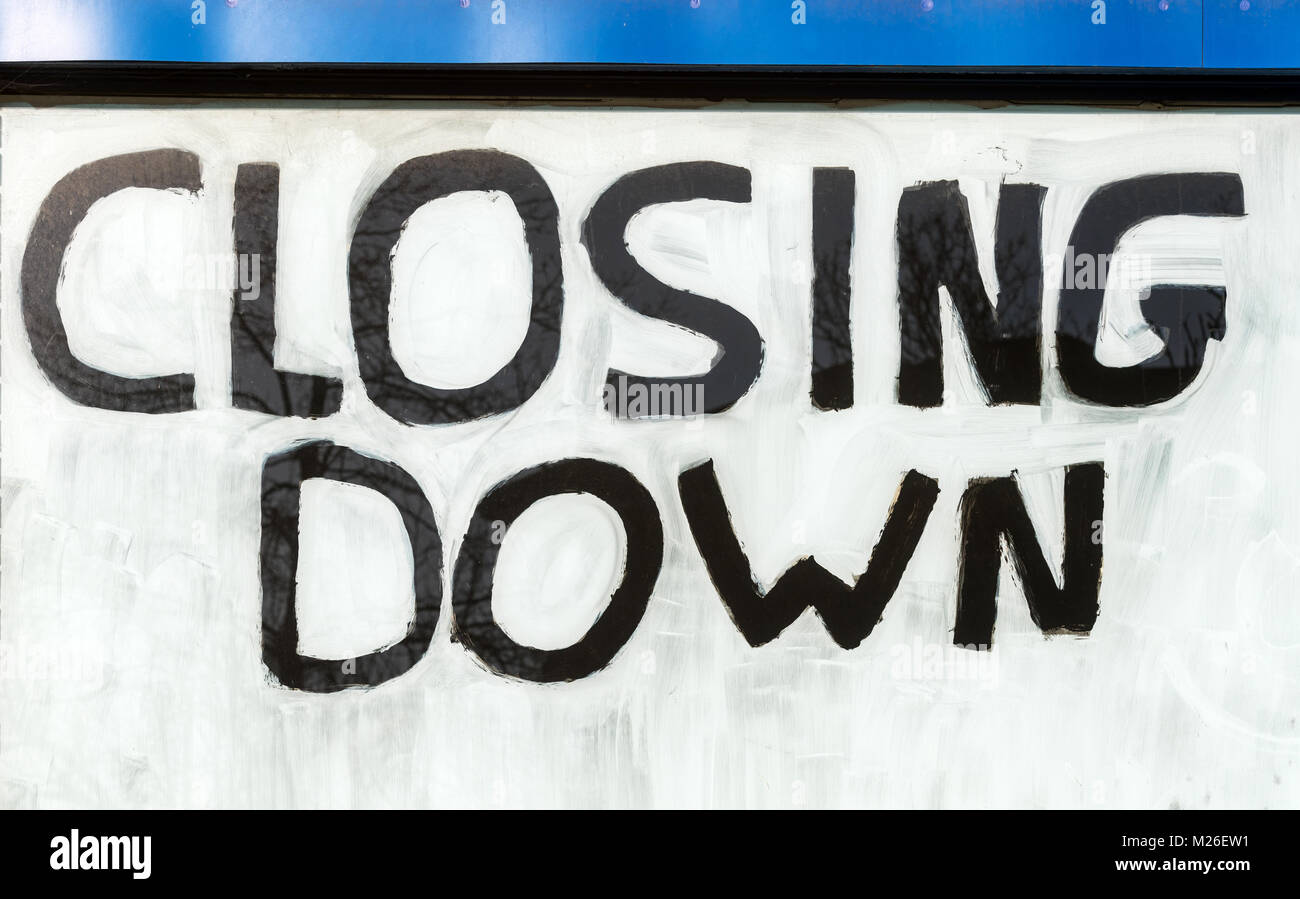 Closing down sale notice in a shop window Stock Photo