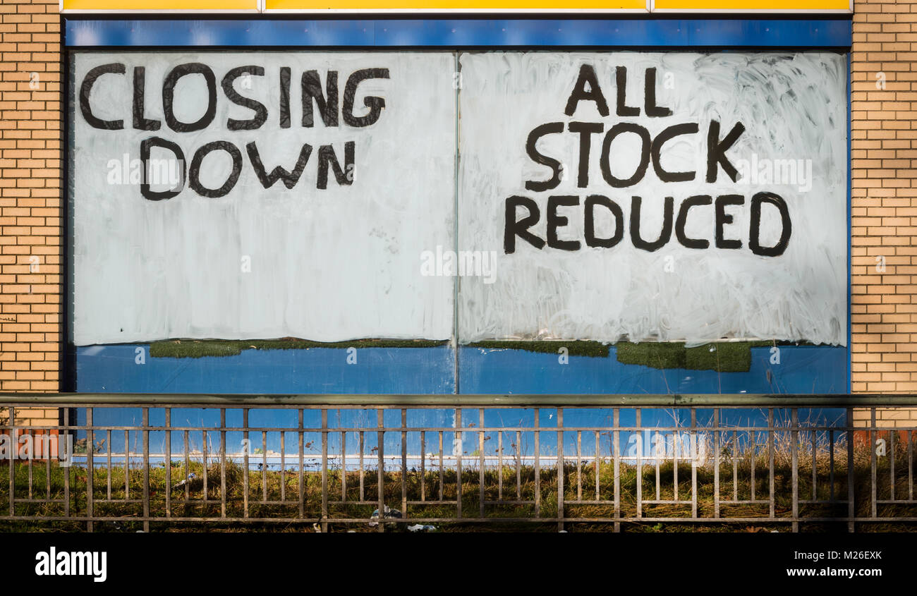 Closing down sale notice in a shop window Stock Photo