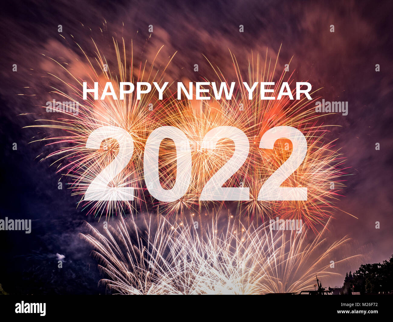 Happy new year 2022 with fireworks background. Celebration New Year 2022 Stock Photo