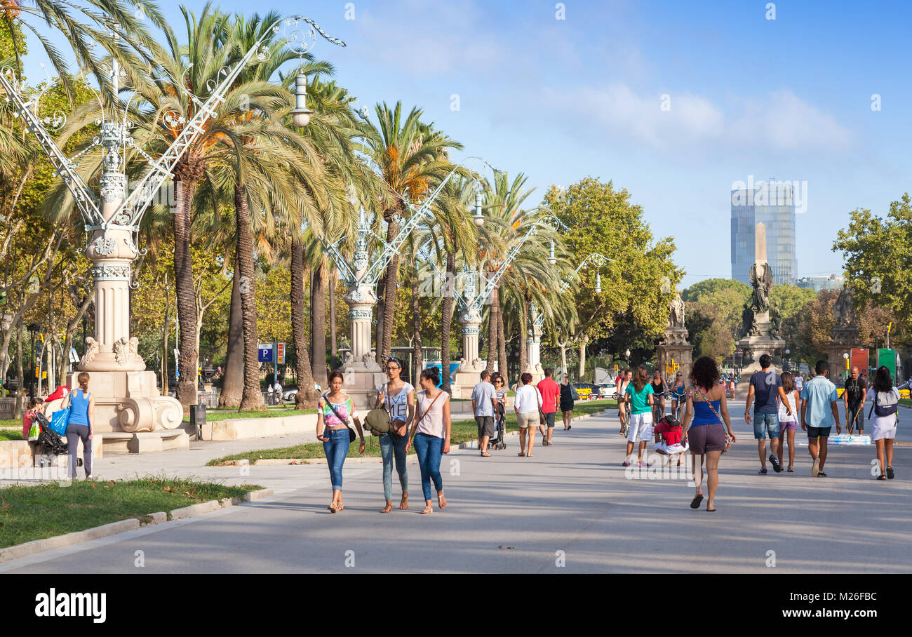 Barcelona, Spain - August 26, 2014: Passeig de Lluis Companys. Tourists walk on promenade in the Ciutat Vella and Eixample districts of Barcelona, Spa Stock Photo