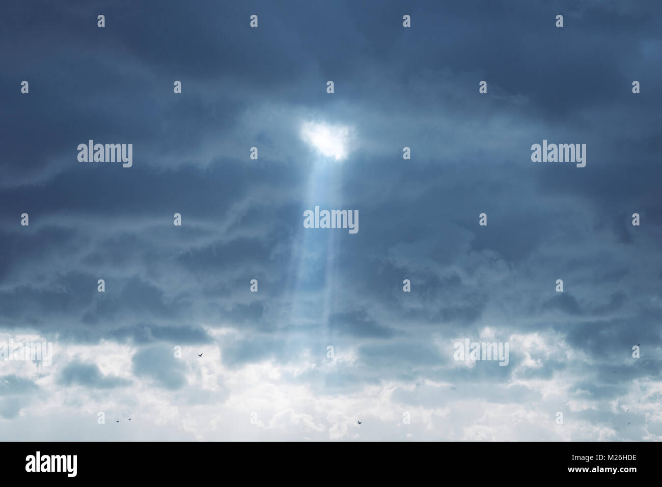 A beam of light from the clouds Stock Photo