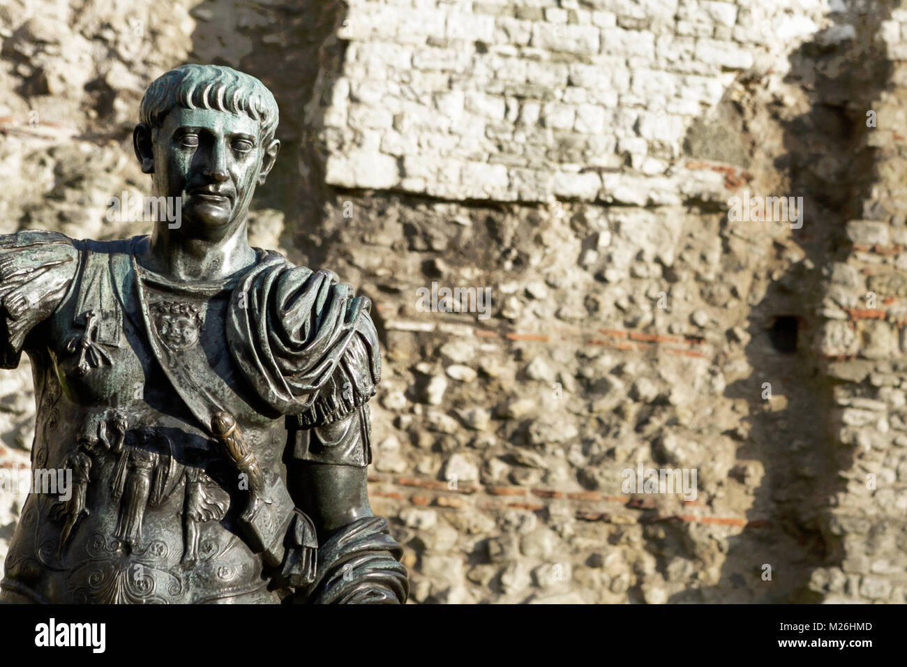 Statue of Trajan Roman Emperor, Roman Statue, London, UK. Roman Wall