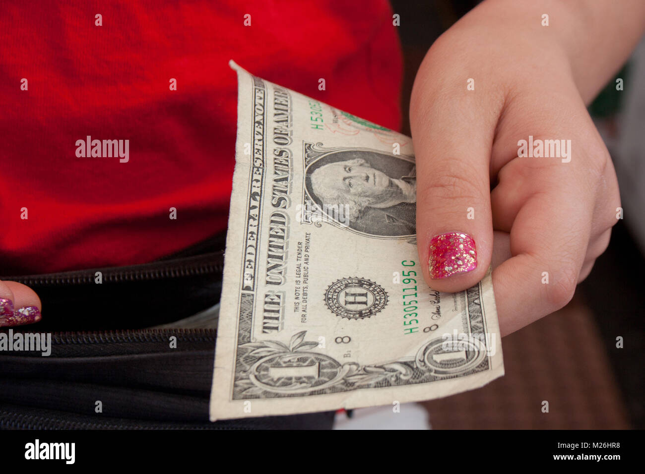 Girl Holding Money Stock Photo