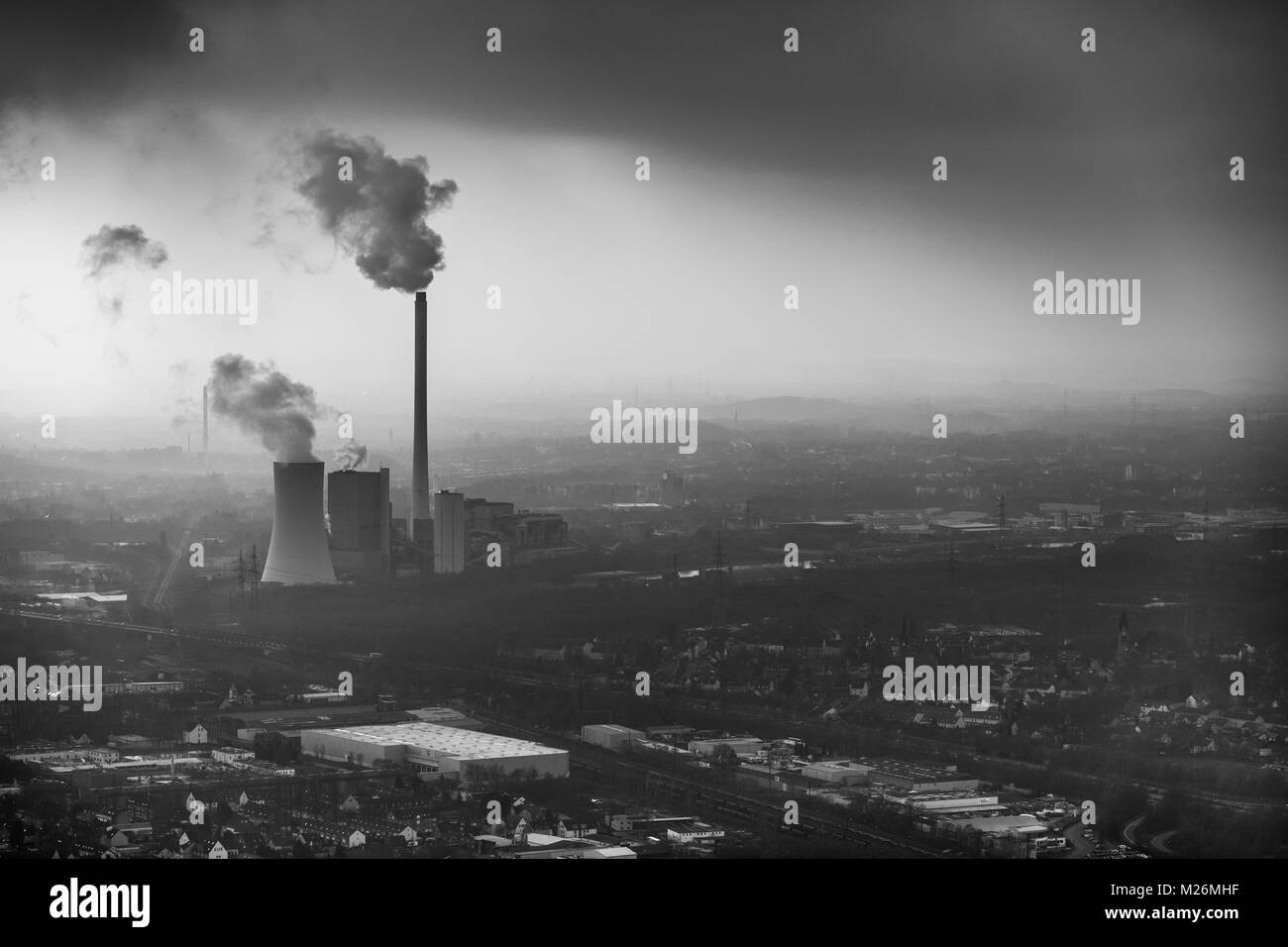 STEAG heating power plant Herne in the haze before industrial backdrop in Herne in the Ruhr area in North Rhine-Westphalia. Conventional coal power pl Stock Photo