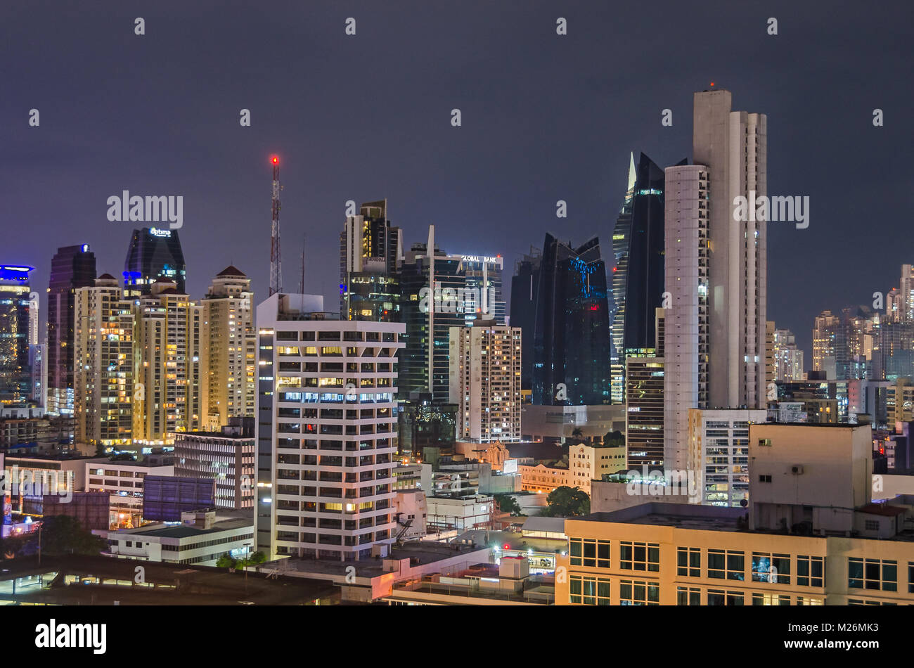 Panama City, Panama - November 2, 2017: Skyline of Panama City at night with buildings of Generalli, Global Bank and hotels. View from the roof of the Stock Photo