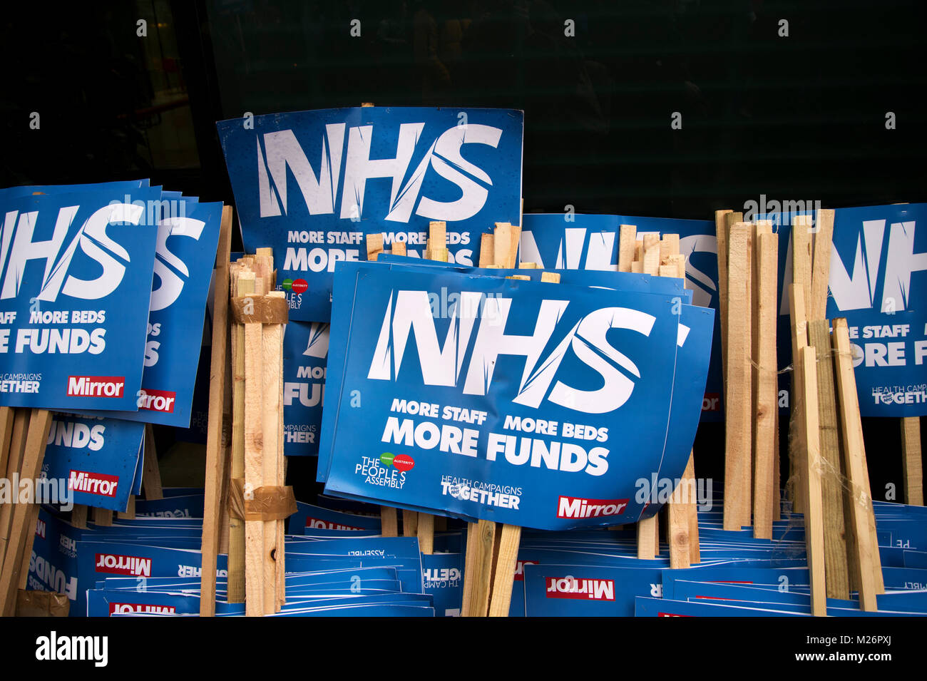 Gower Street, London. Demonstration called by the People's Assembly in support of the NHS (National Health Service}. A pile of placards saying 'NHS. M Stock Photo