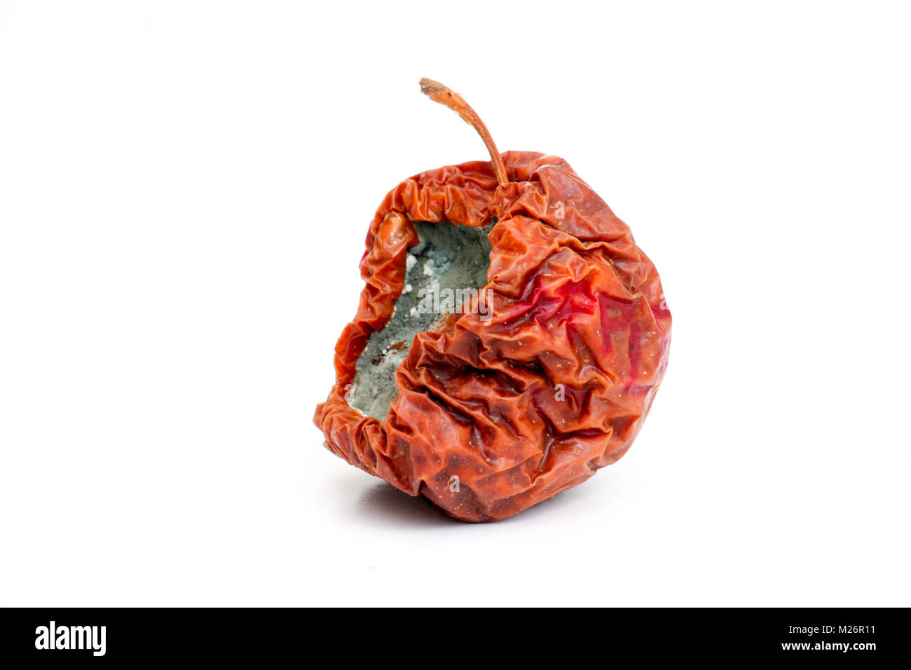 Half a rotten apple on white background,image of a Stock Photo