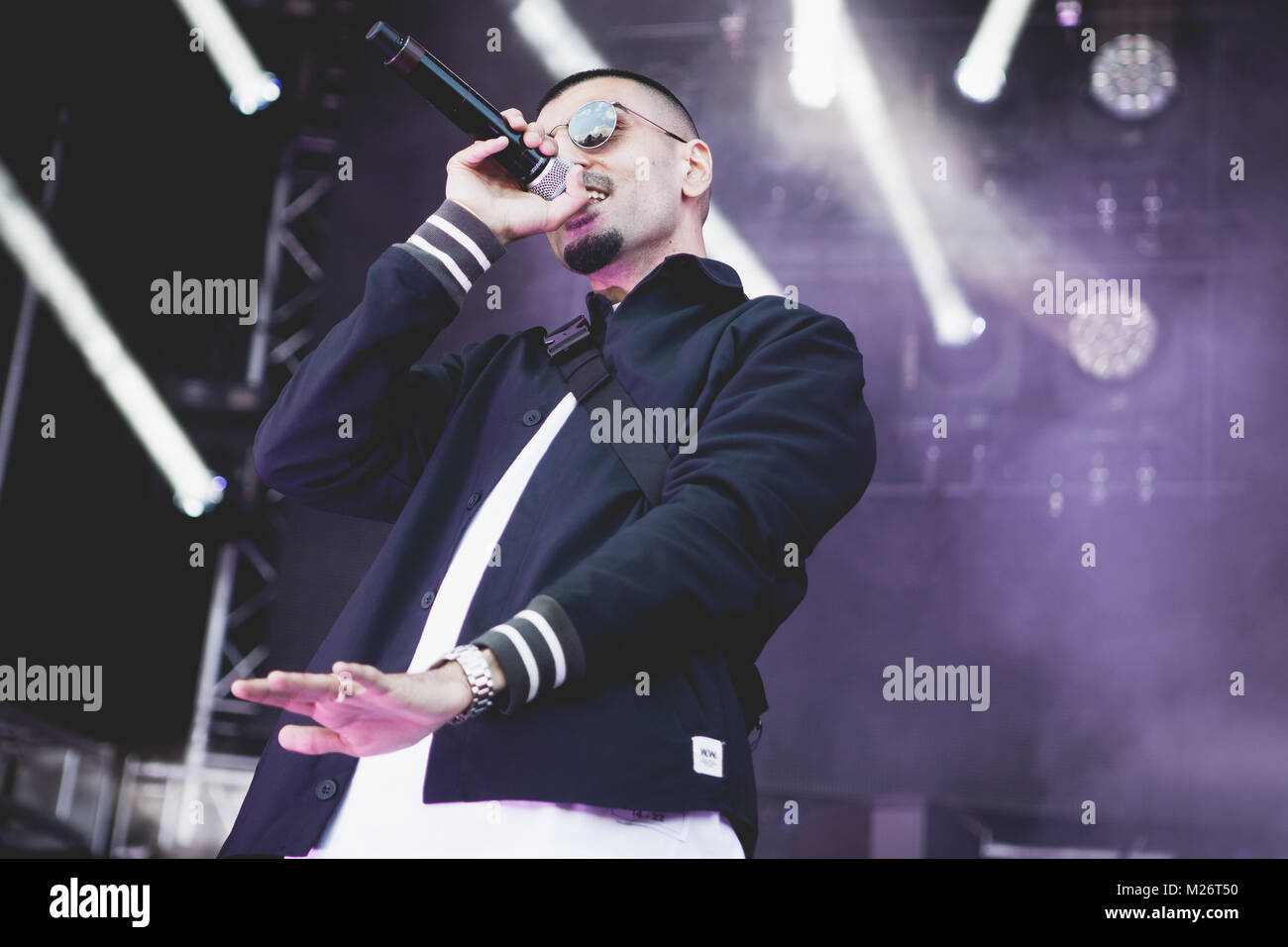 The Danish rapper Sivas (Stylized S!vas) performs a live concert at the Apollo Countdown stage at Roskilde Festival 2014. Sivas mess up the Danish dictionary combining Danish, English and Arabian in one big ghetto mixture. Denmark 02.07.2014. Stock Photo