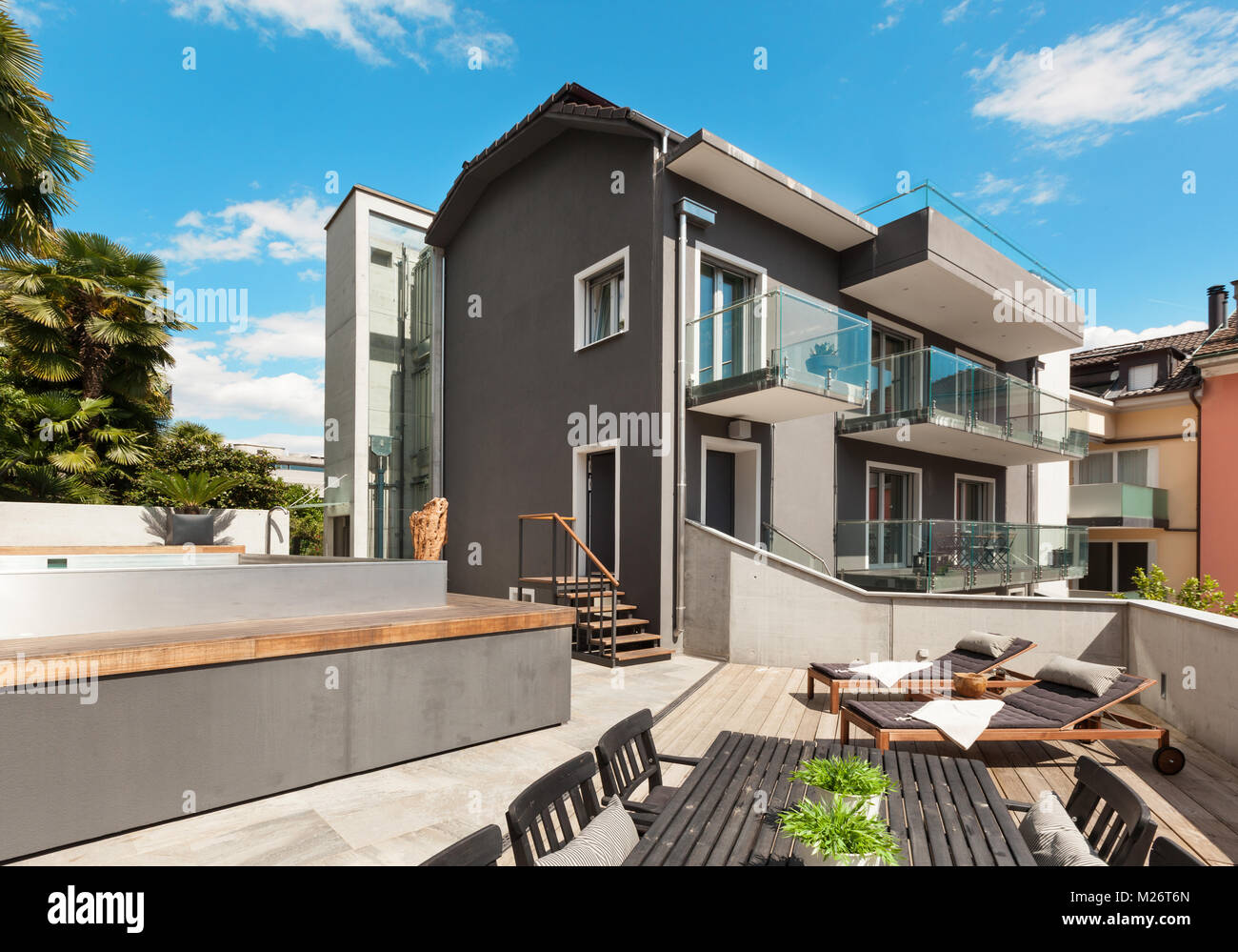 Modern house, outdoor, modern garden furniture Stock Photo Alamy