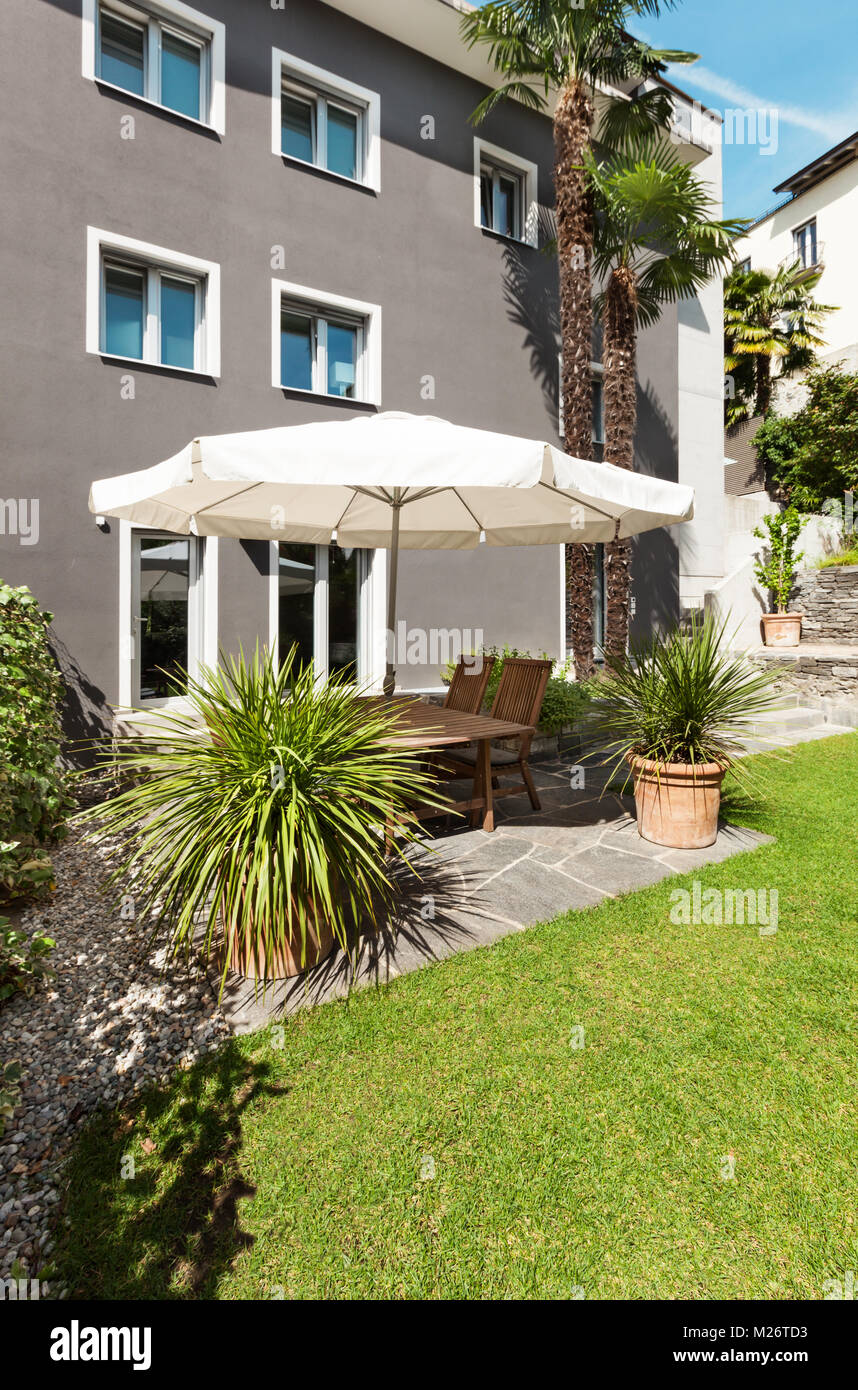 Modern house, beautiful patio, modern furniture Stock Photo Alamy