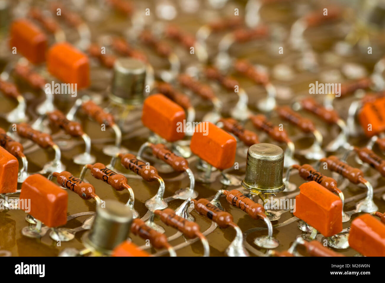 Vintage electronic components on printed circuit board Stock Photo