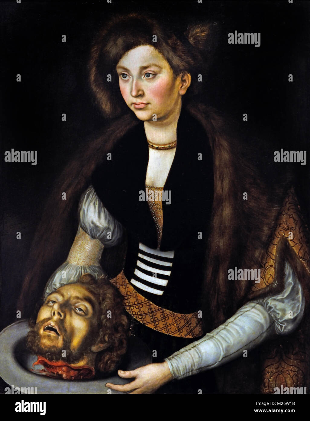 Salome 16th-century Lucas Cranach the Elder (1472-1553) German Germany ( According to Mark 6:21–29 a daughter of Herodias danced before Herod and her mother Herodias at the occasion of his birthday, and in doing so gave her mother the opportunity to obtain the head of John the Baptist.  ) Stock Photo