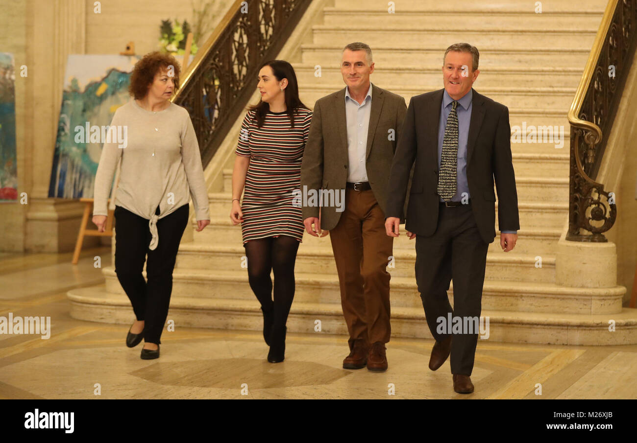 (left to right) Sinn Fein's Caral Ni Chuilin, Megan Fearon, Declan Kearney and Conor Murphy before speaking to the media at Stormont Parliament Buildings after the first round-table talks between all Northern Ireland's major parties began. Stock Photo