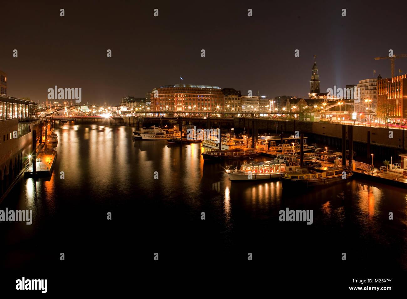 View of Hamburg by night with Binnenhafen, Slomanhaus and St. Michaelis church ('Michel') Stock Photo