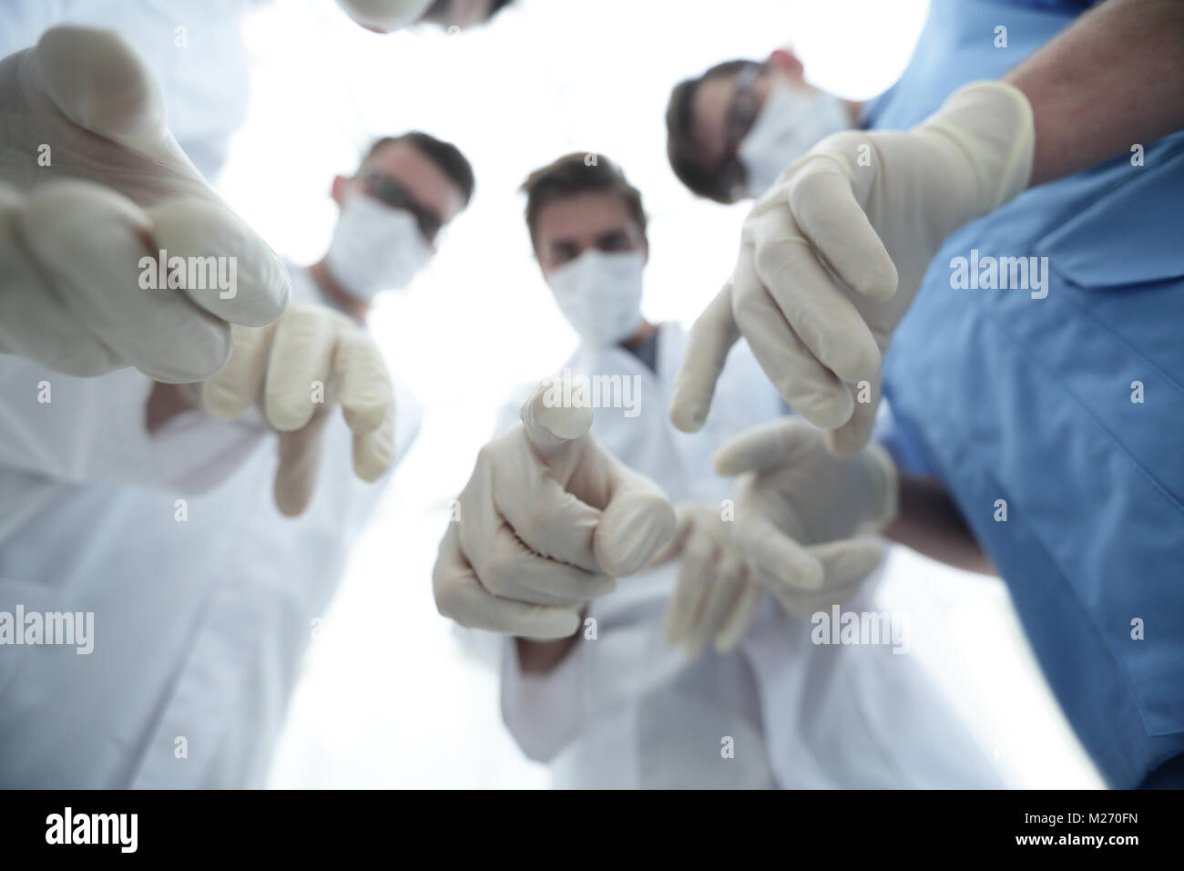 bottom view.a group of doctors in the operating room. Stock Photo